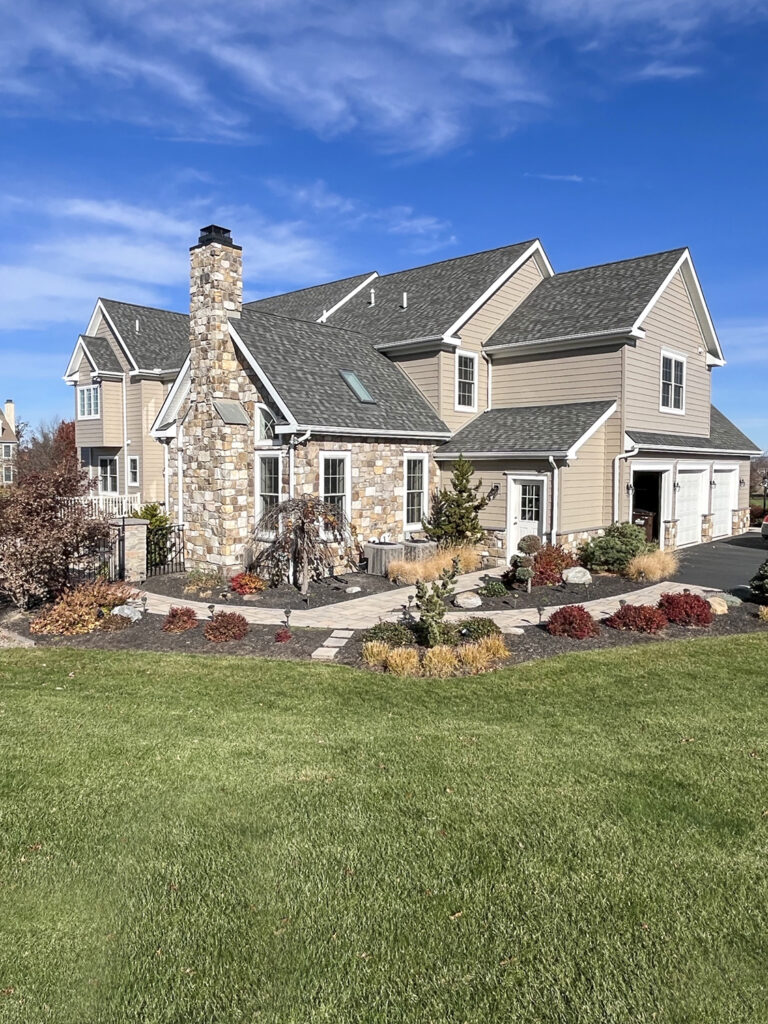 Everlast composite siding exterior installed as a low maintenance alternative to James Hardie fiber cement siding for homeowners seeking durable siding solutions.